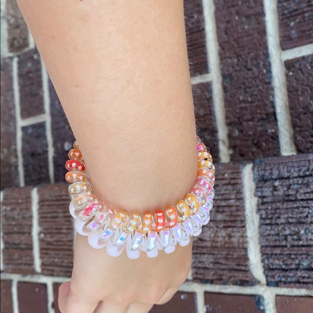 A three set ponytail/bracelet
